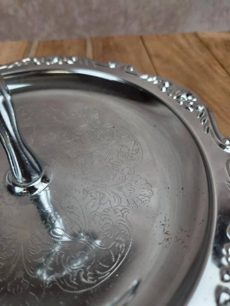 Small vintage round display stand in chrome metal – rococo style