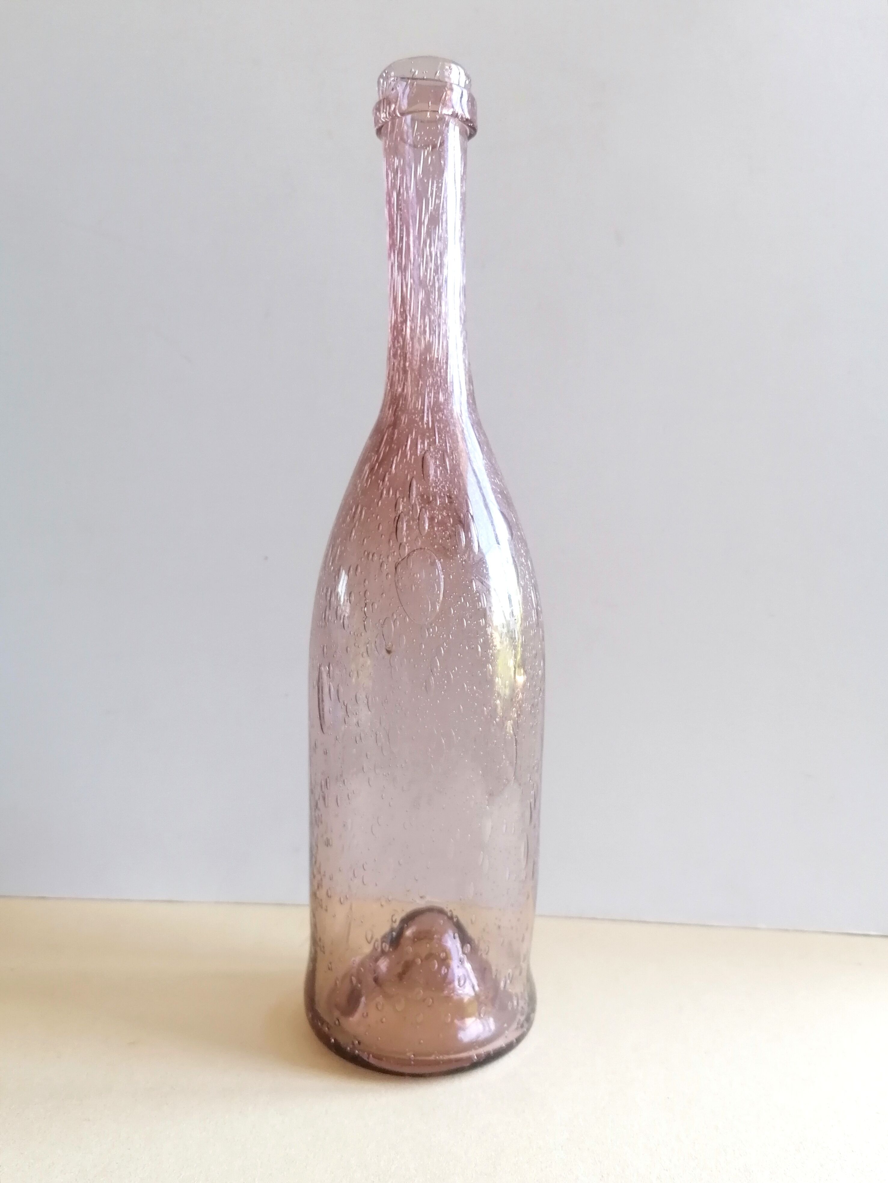 Biot bubble glass bottle
