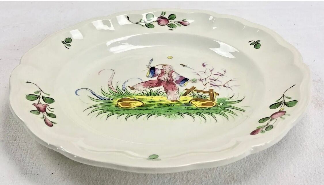 Hollow round dish décor with Chinese Saint Clément Lunéville