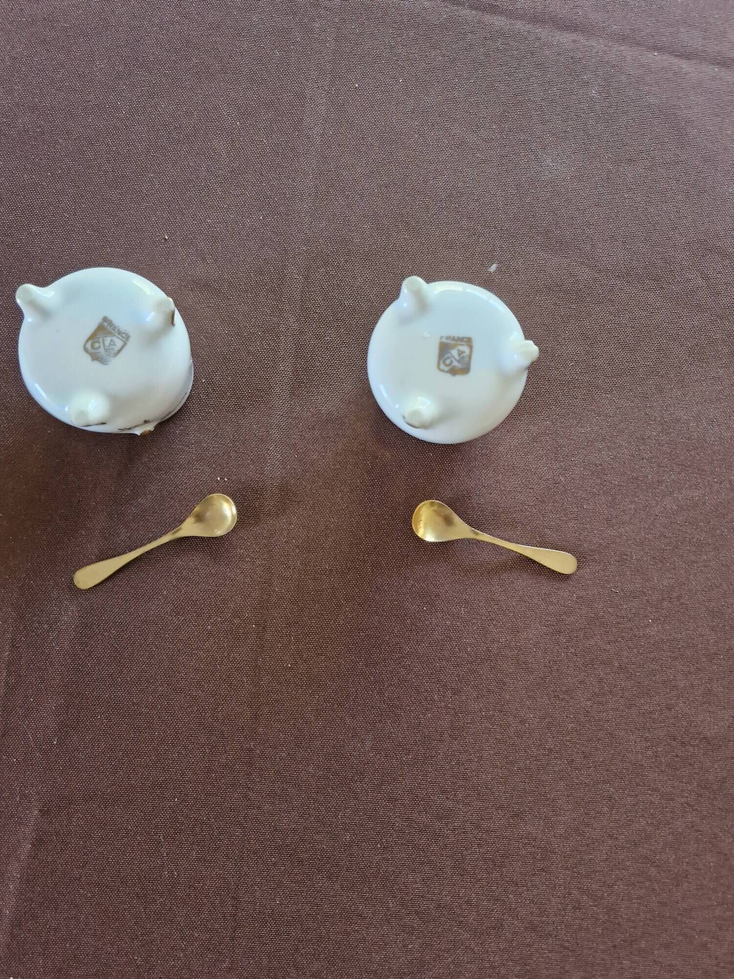 Vintage porcelain salt and pepper shakers.