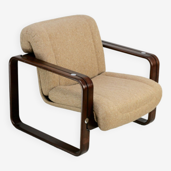 Fauteuil moderniste. Laine, bois et acier. Circa 1970