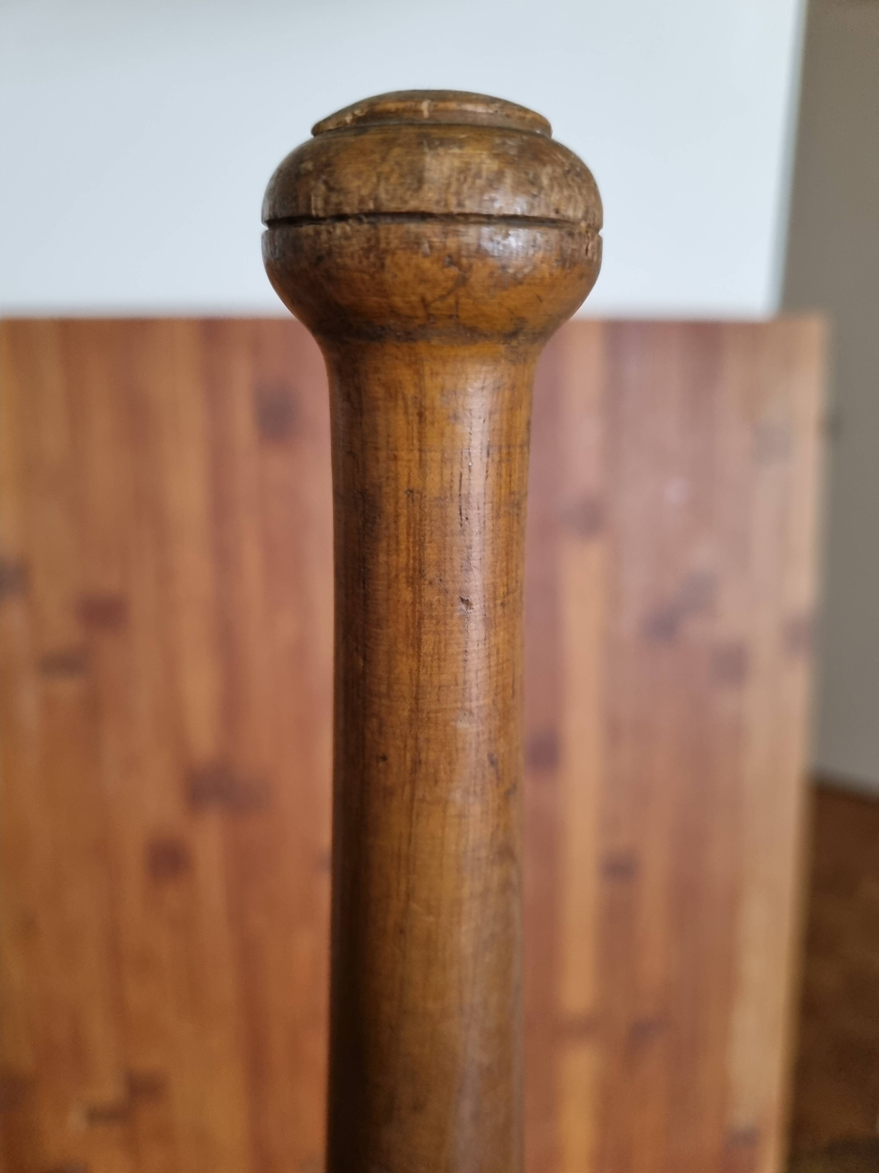 Old wooden juggling pin