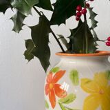 White vase with flowers