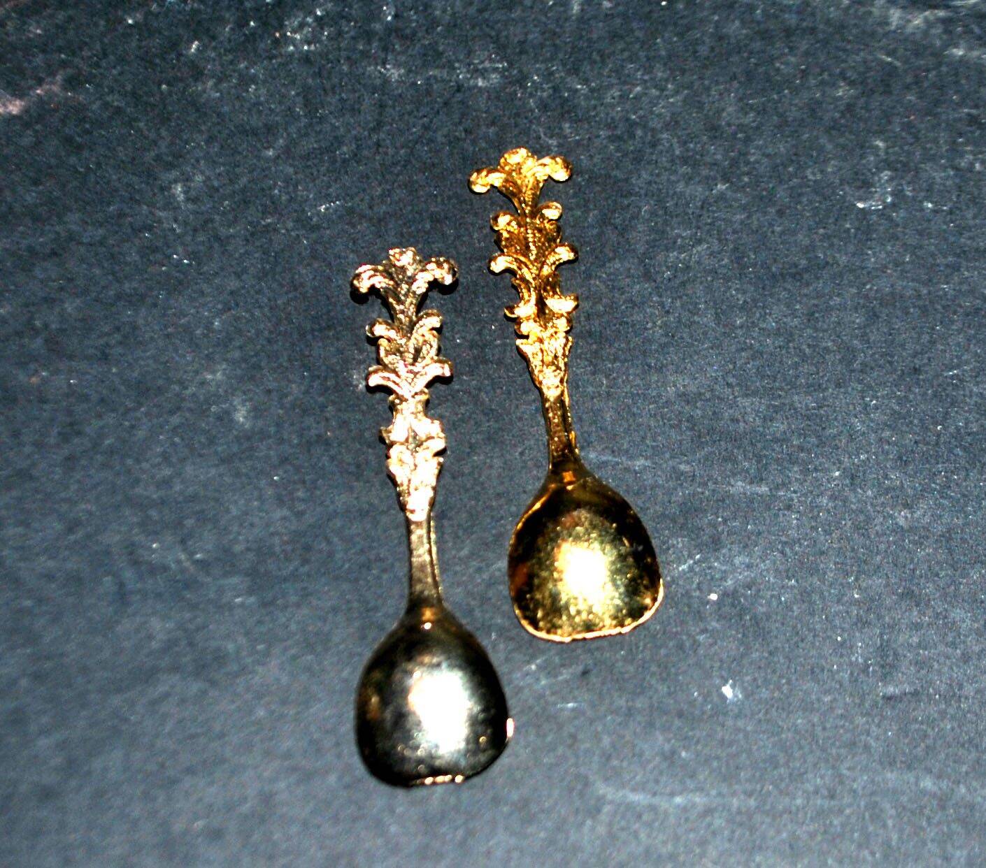 Set of 2 vintage gold metal salt spoons.
