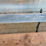Antique garden bench with cast iron legs