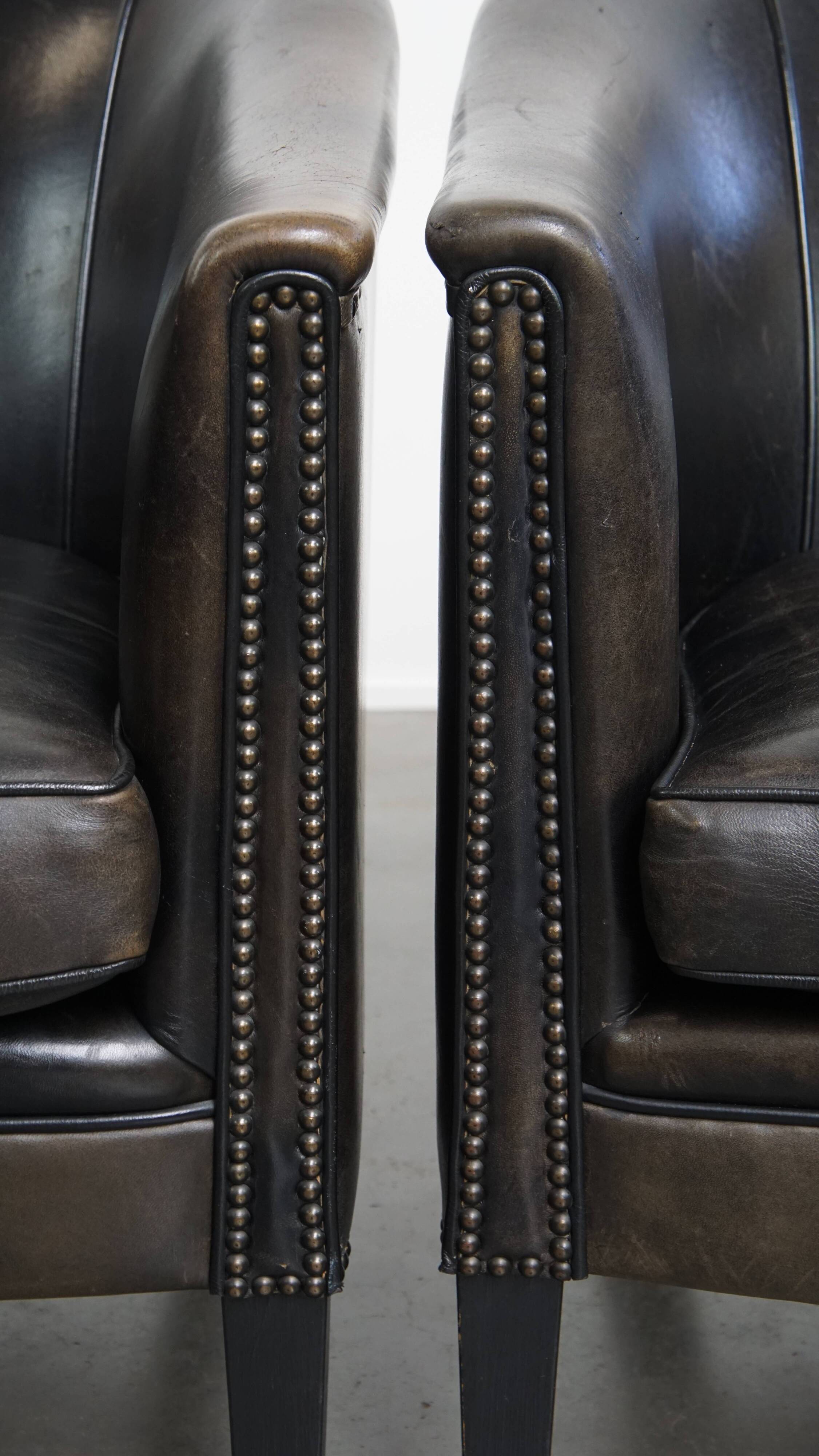 Set of 2  black/grey sheepskin leather club chairs