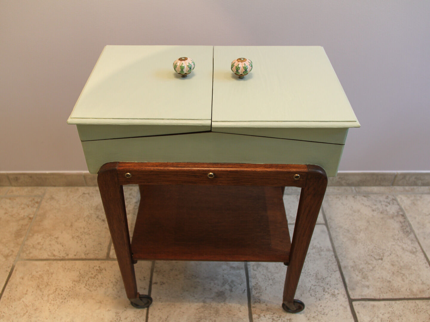 Worker green wood feet wheels