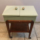 Worker green wood feet wheels