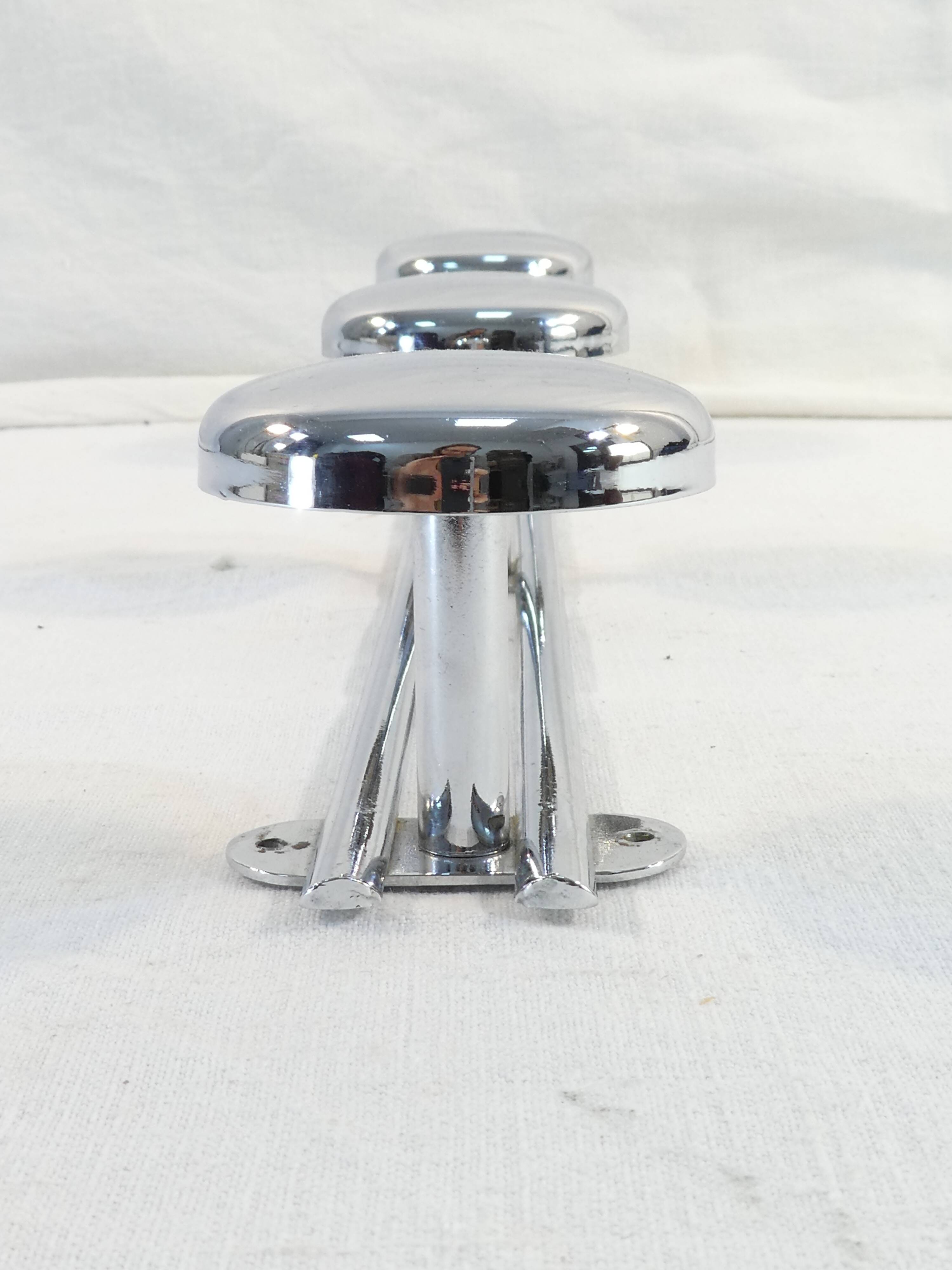 Coat rack has 3 pastes in chromed metal vintage