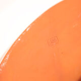 Portuguese XL dish in orange enamelled clay with unbleached flowers and green leaves