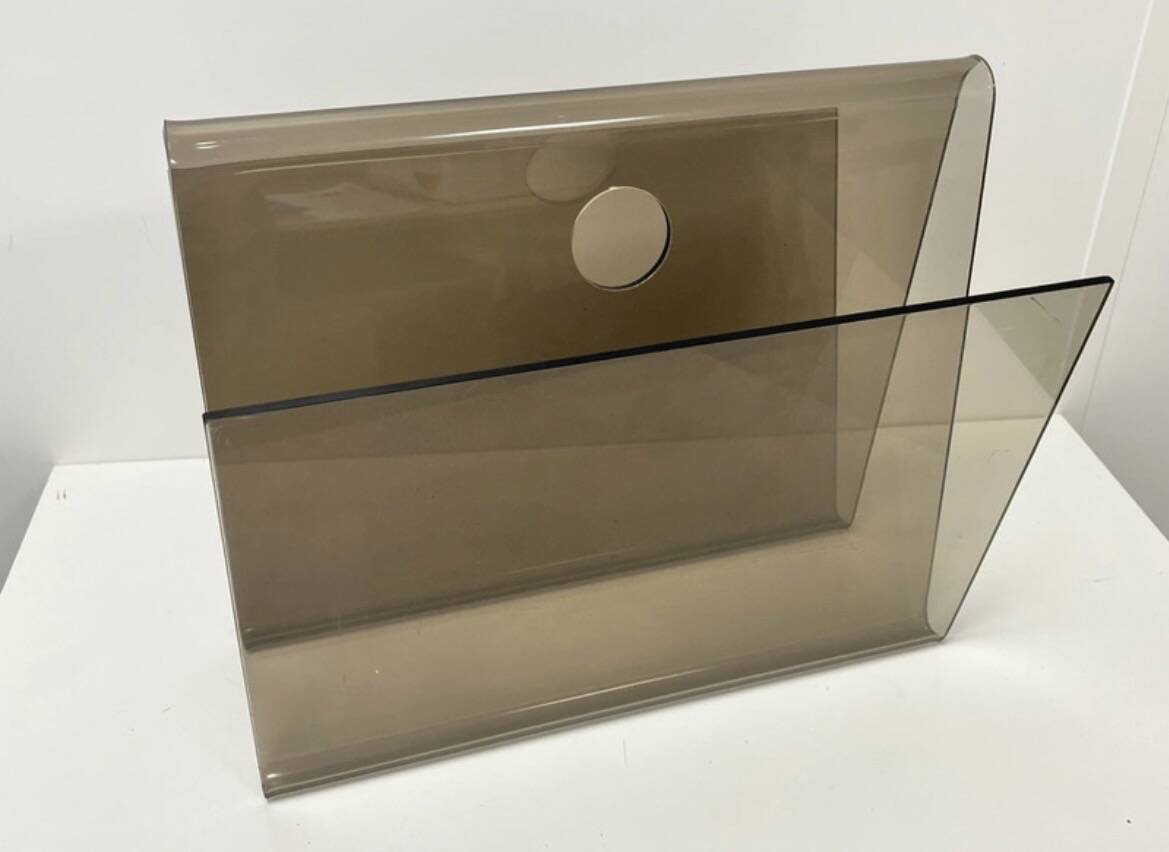 Smoked plexiglass magazine rack in the style of Michel Dumas, France, 1970s.