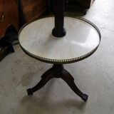 Rotating store floor in mahogany and marble of the nineteenth century