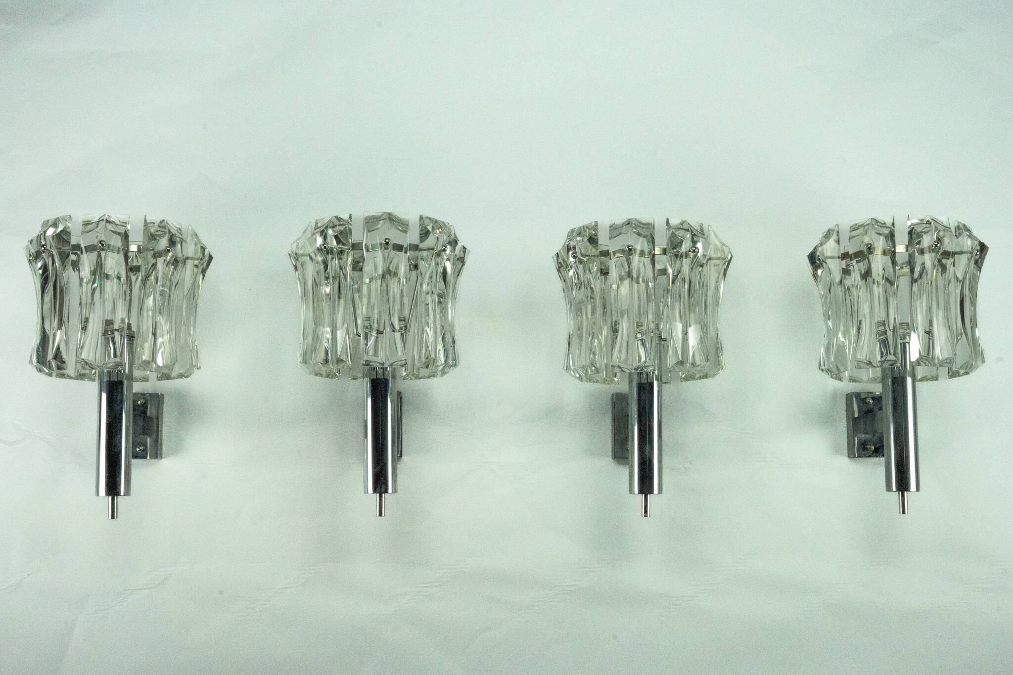 Set of four large Murano glass elements and chromed brass sconces, Italy 60