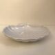 White dish with scallops by Emile Henry