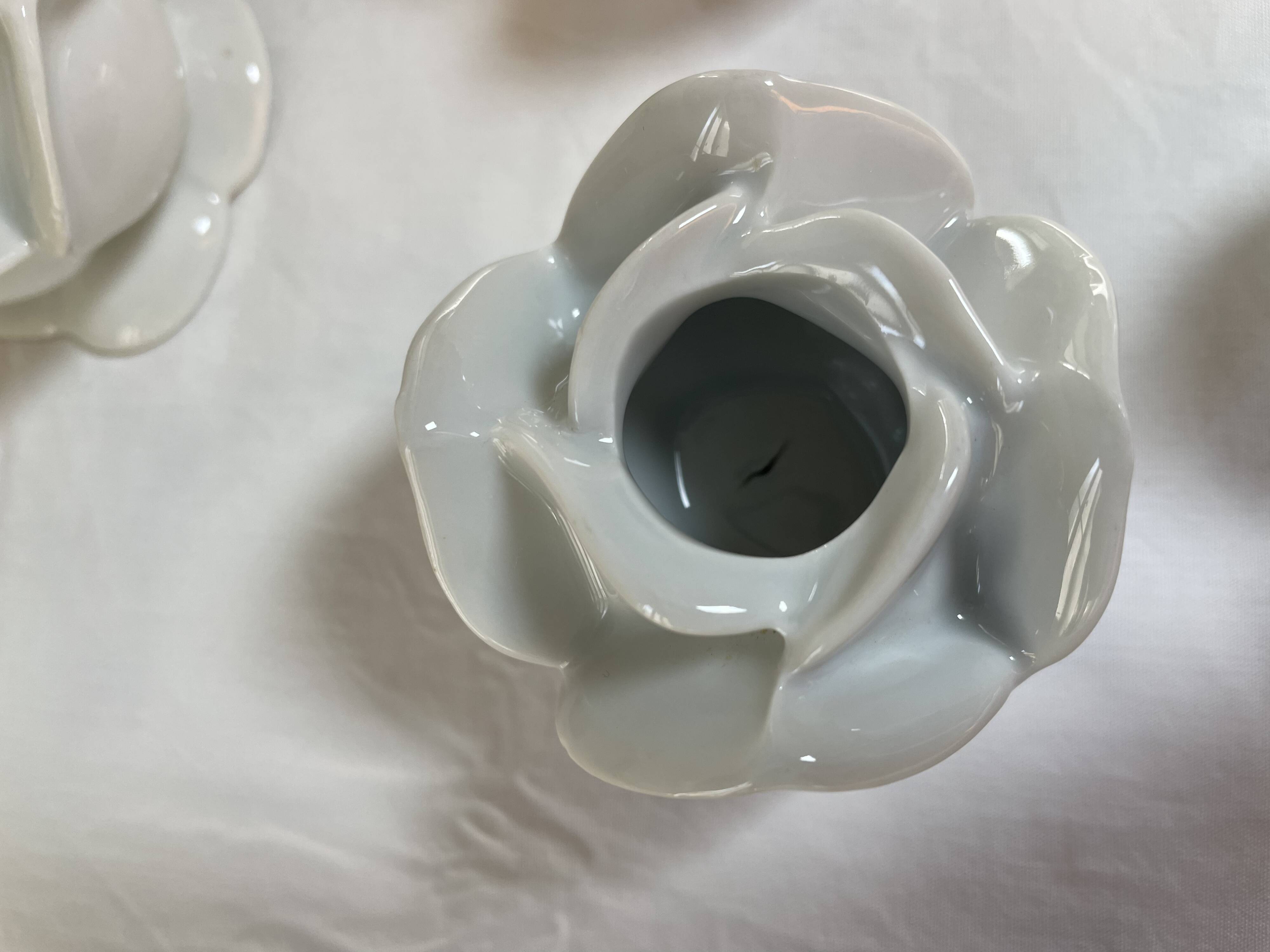 White porcelain rose shaped candle holders