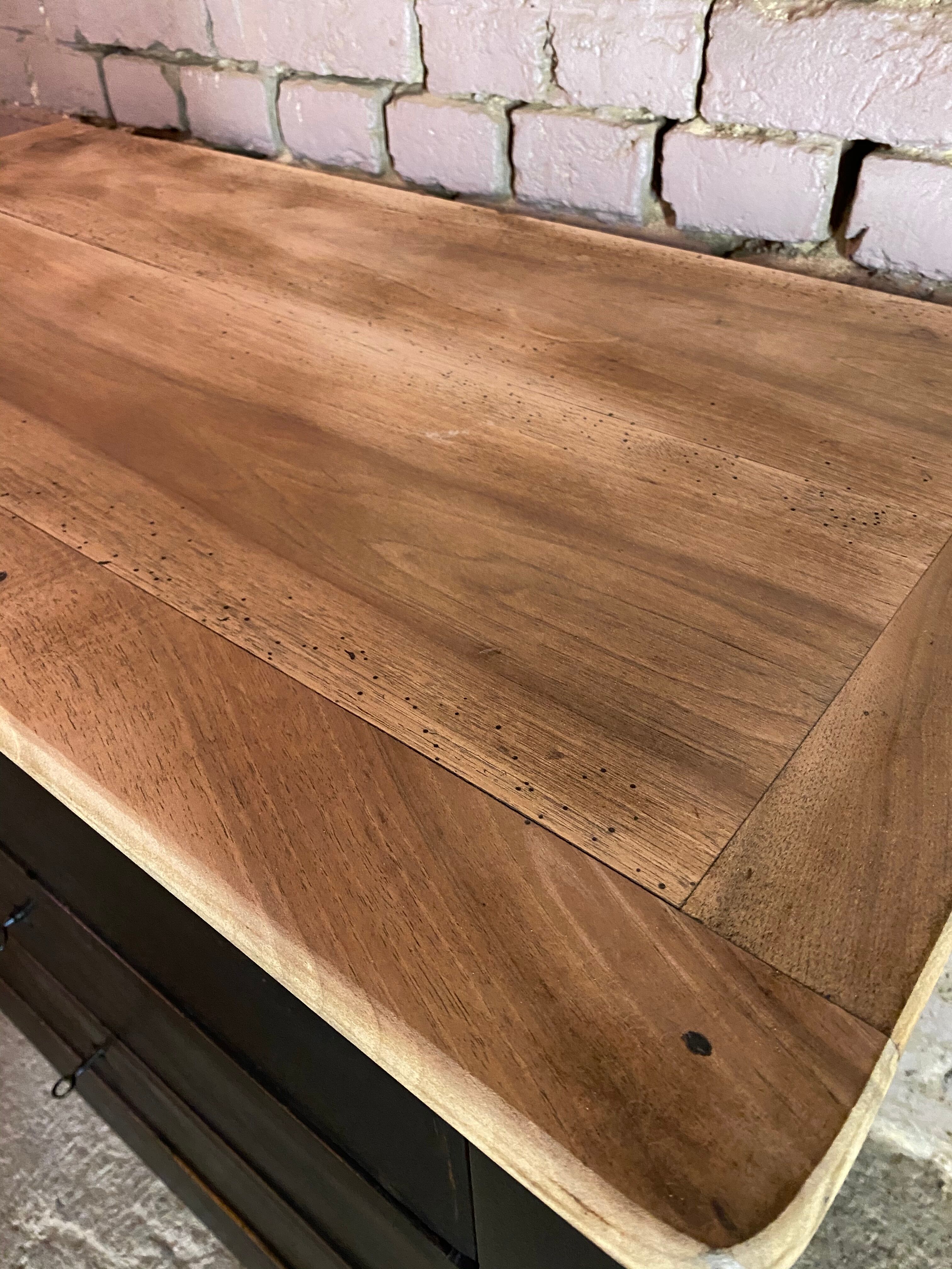 Old black patinated chest of drawers