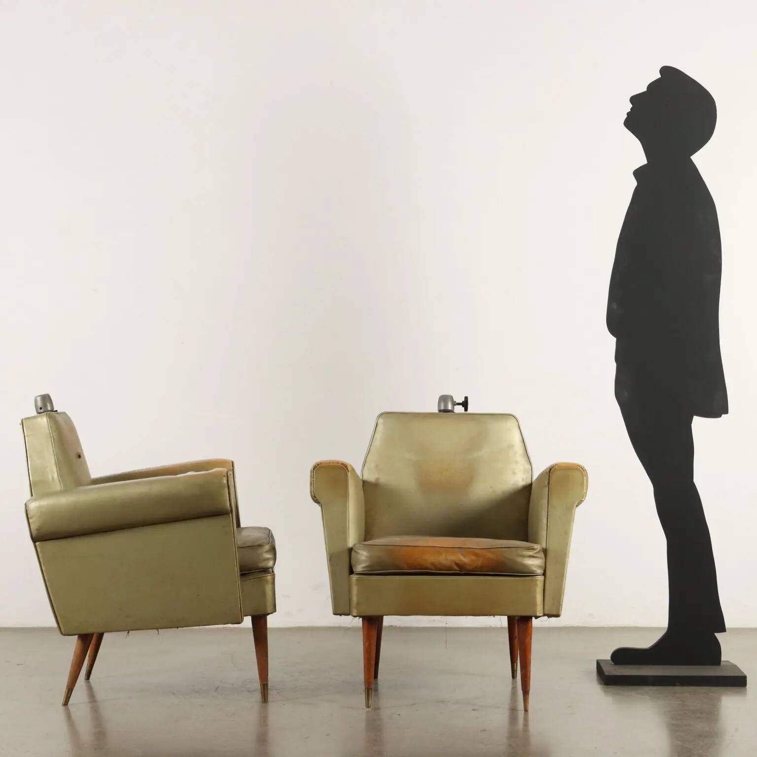 Pair of vintage armchairs from the 1950s in wood and faux leather, Argentina.
