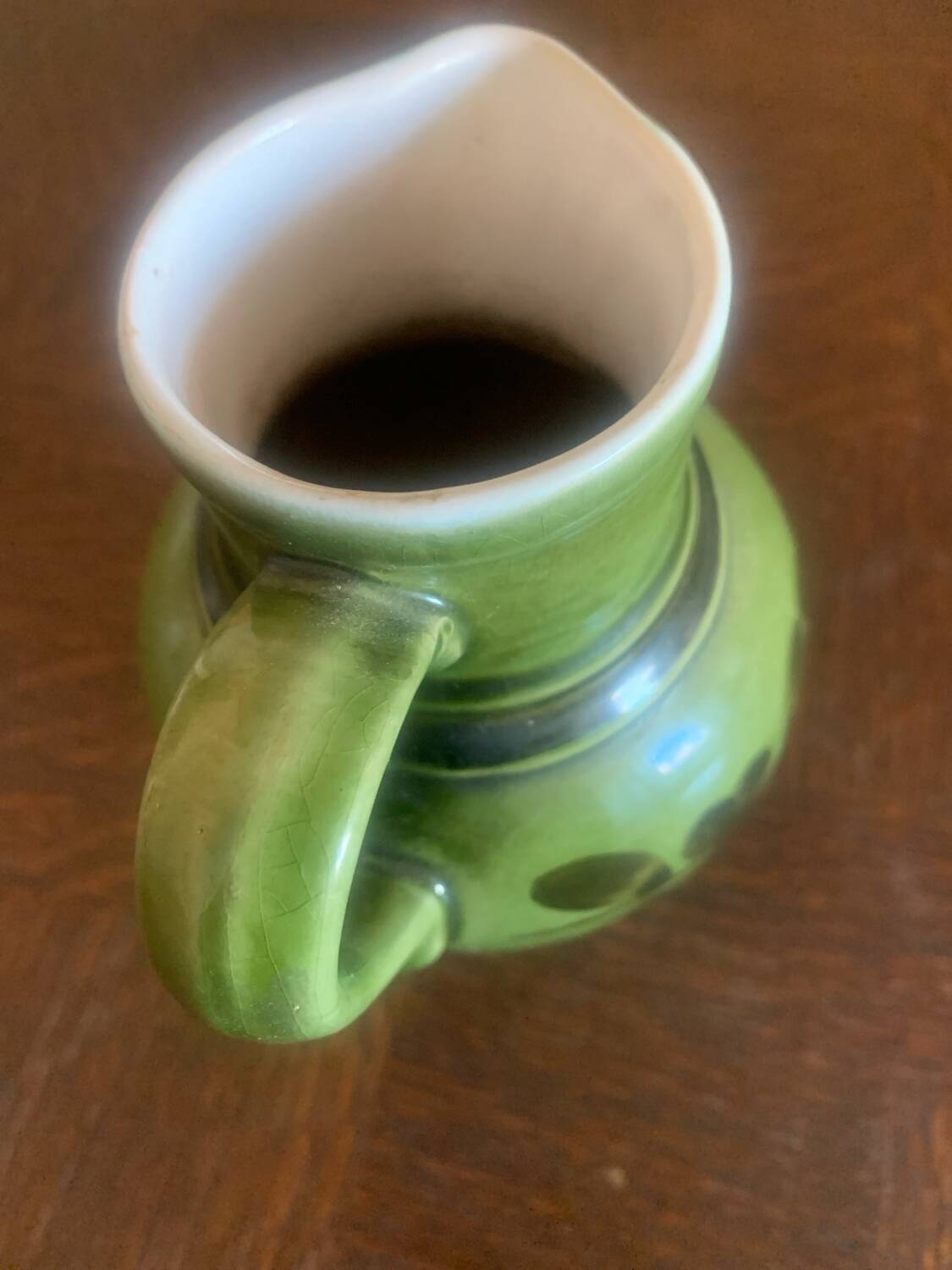 Green ceramic jug