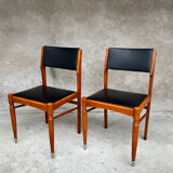 2 wooden and faux leather chairs in Scandinavian style