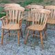 Set de 4 chaises et 1 fauteuil style montagne en chêne