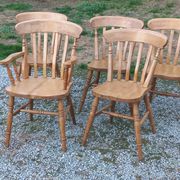 Set of 4 chairs and 1 armchair in mountain style made of oak.