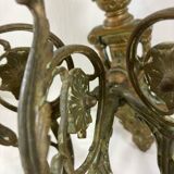 Pair of 3-light wall sconces in gilt bronze in the style