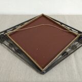 Bevelled wrought iron mirror