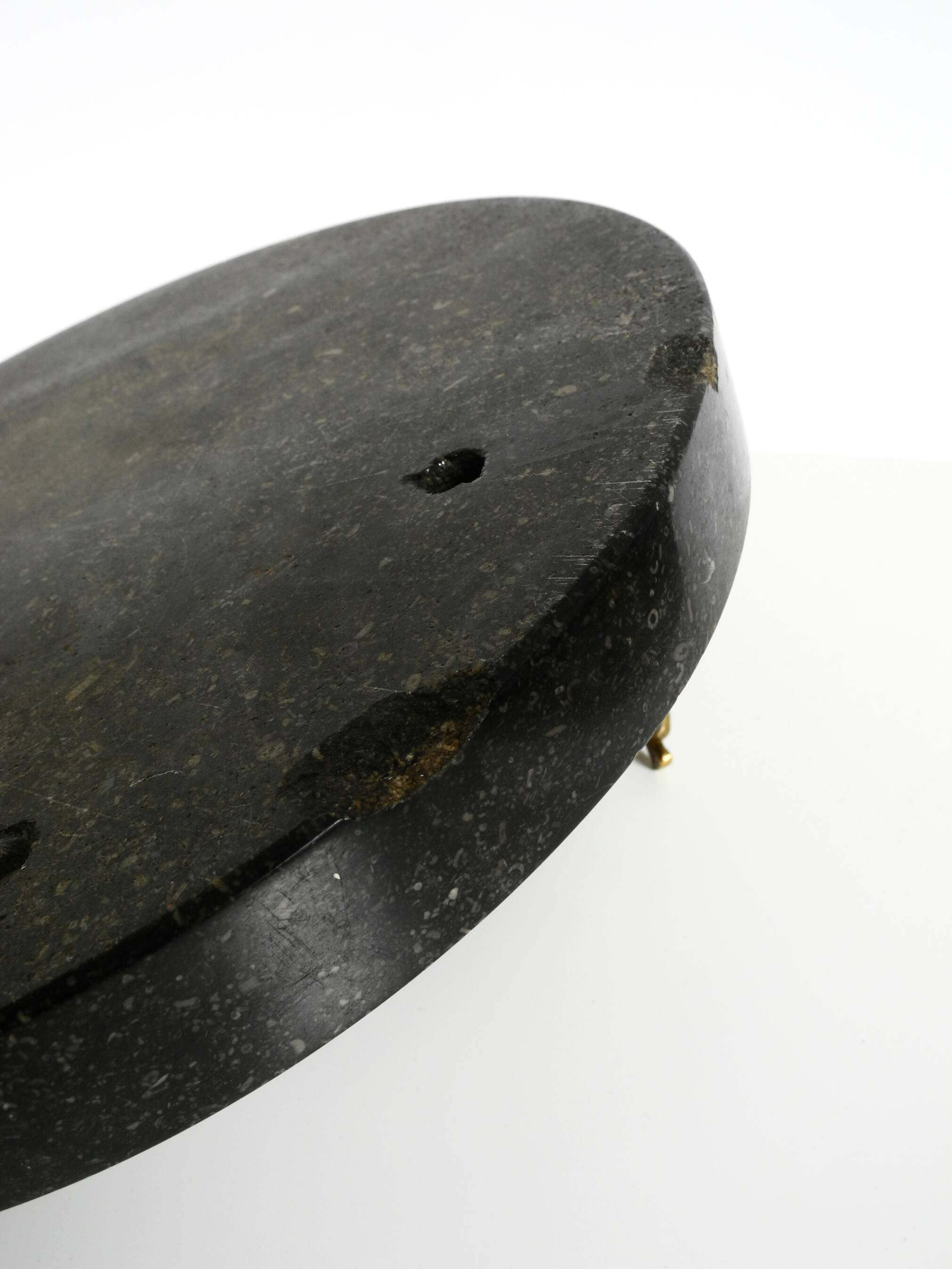 Beautiful, large black granite valet tray featuring a brass peacock, circa