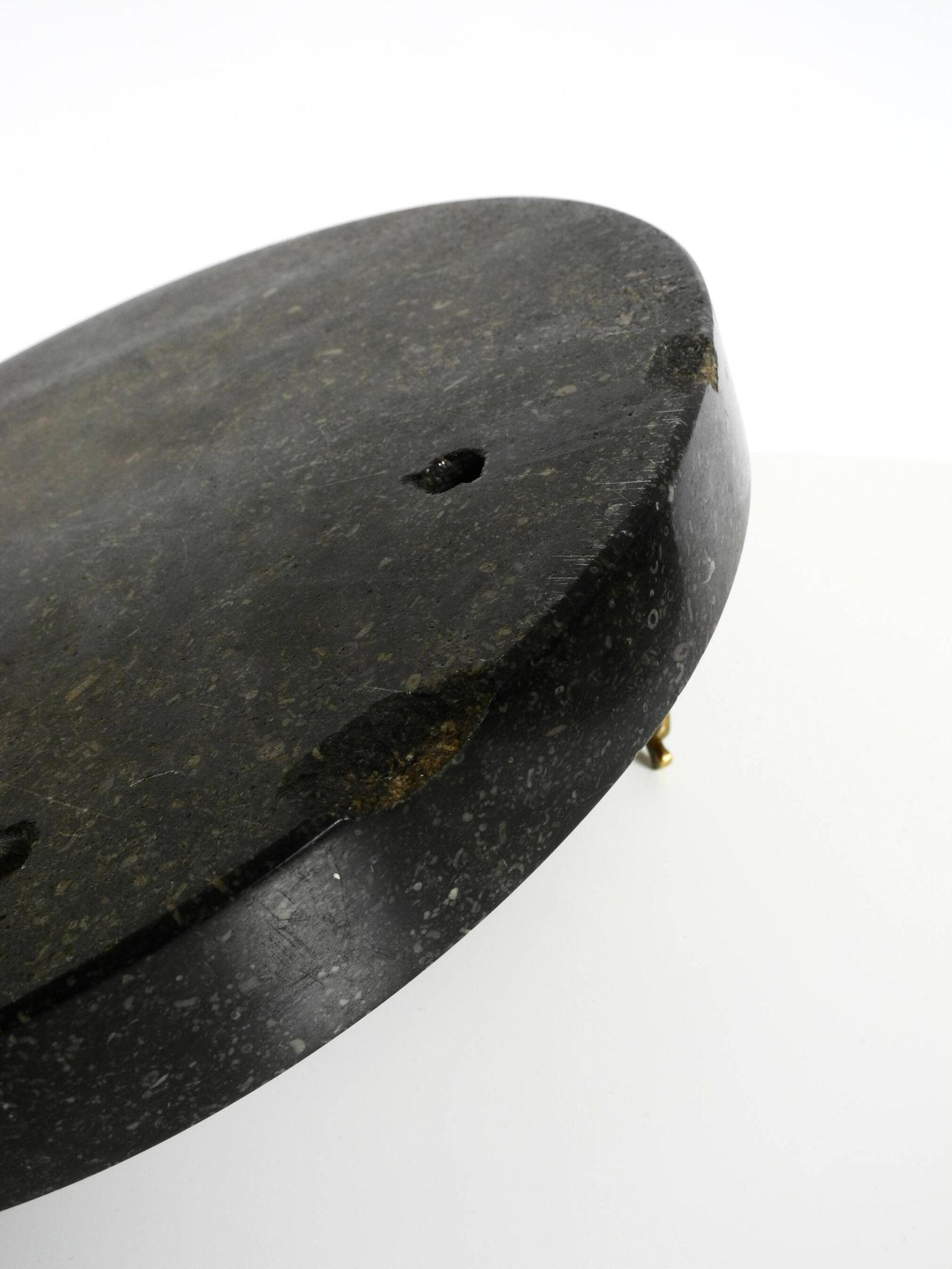 Beautiful, large black granite valet tray featuring a brass peacock, circa