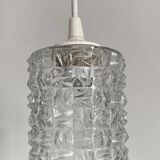 Small cylindrical molded glass pendant light
