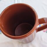 Enamelled clay pitcher