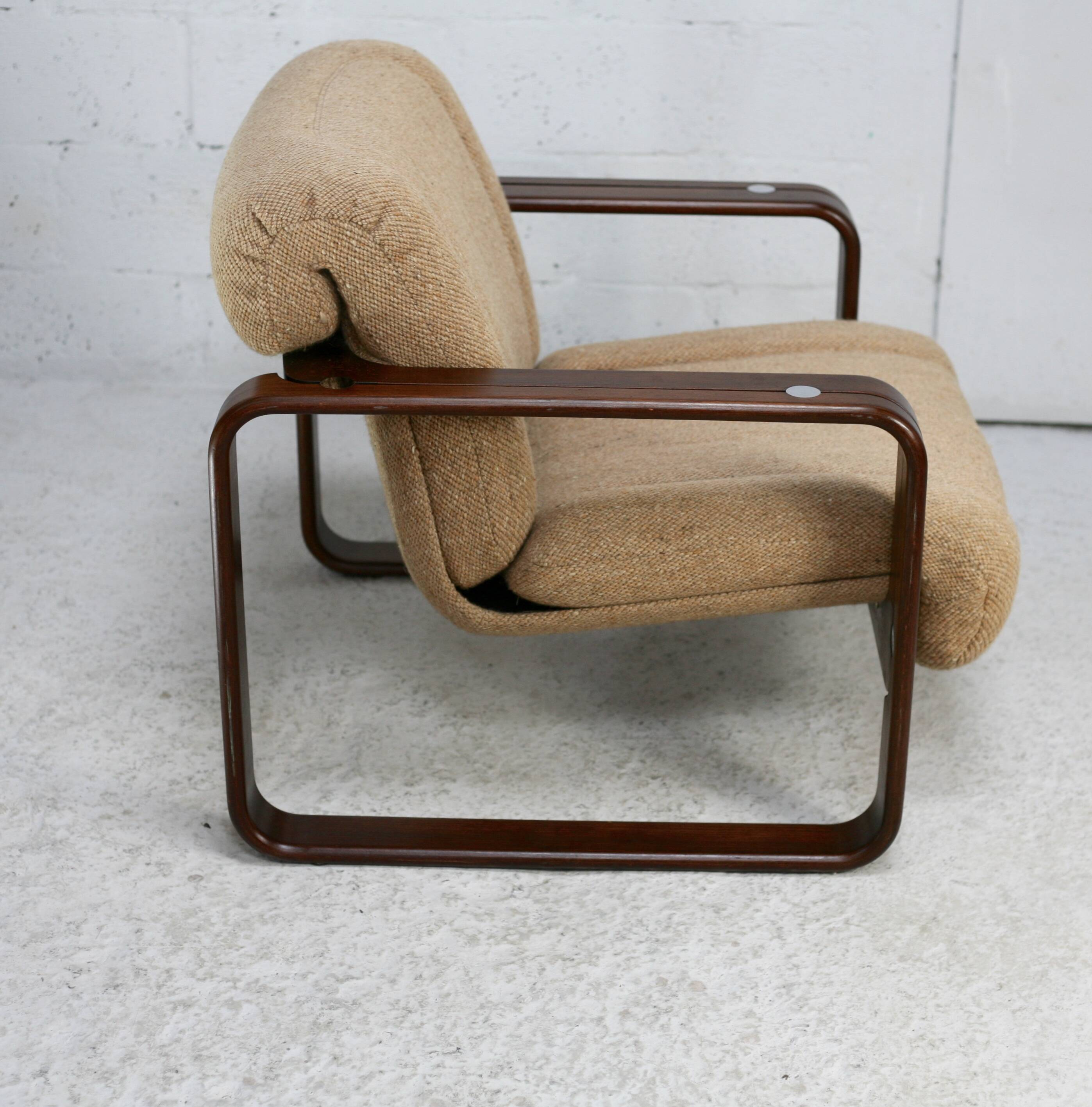Modernist armchair. Wool, wood and steel. Circa 1970
