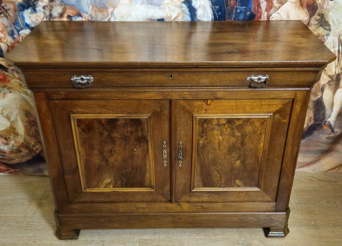 Low buffet with a curved front from the Louis Philippe period in walnut.
