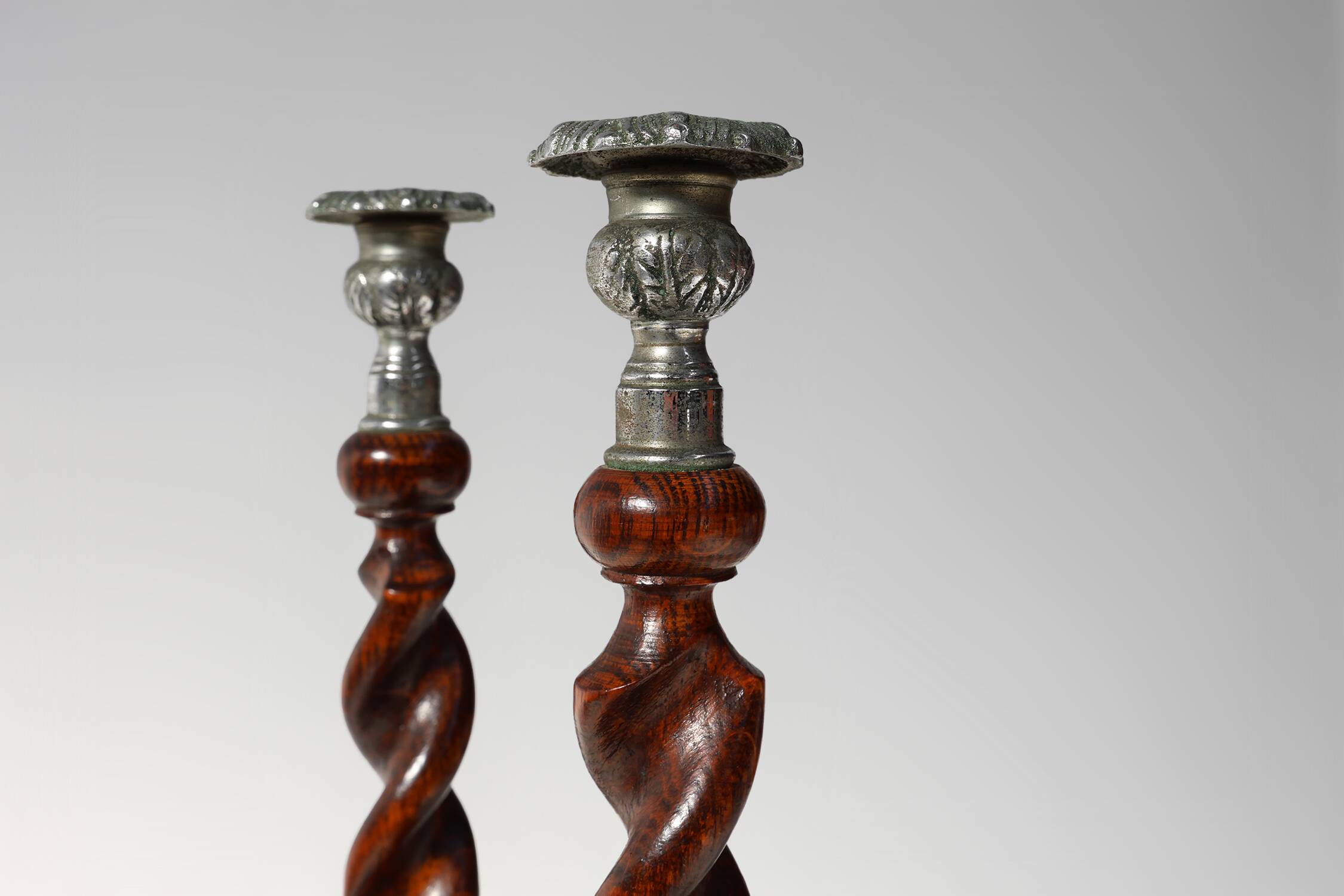Pair of French Barley Twist candlesticks in wood with silver-plated bobeche