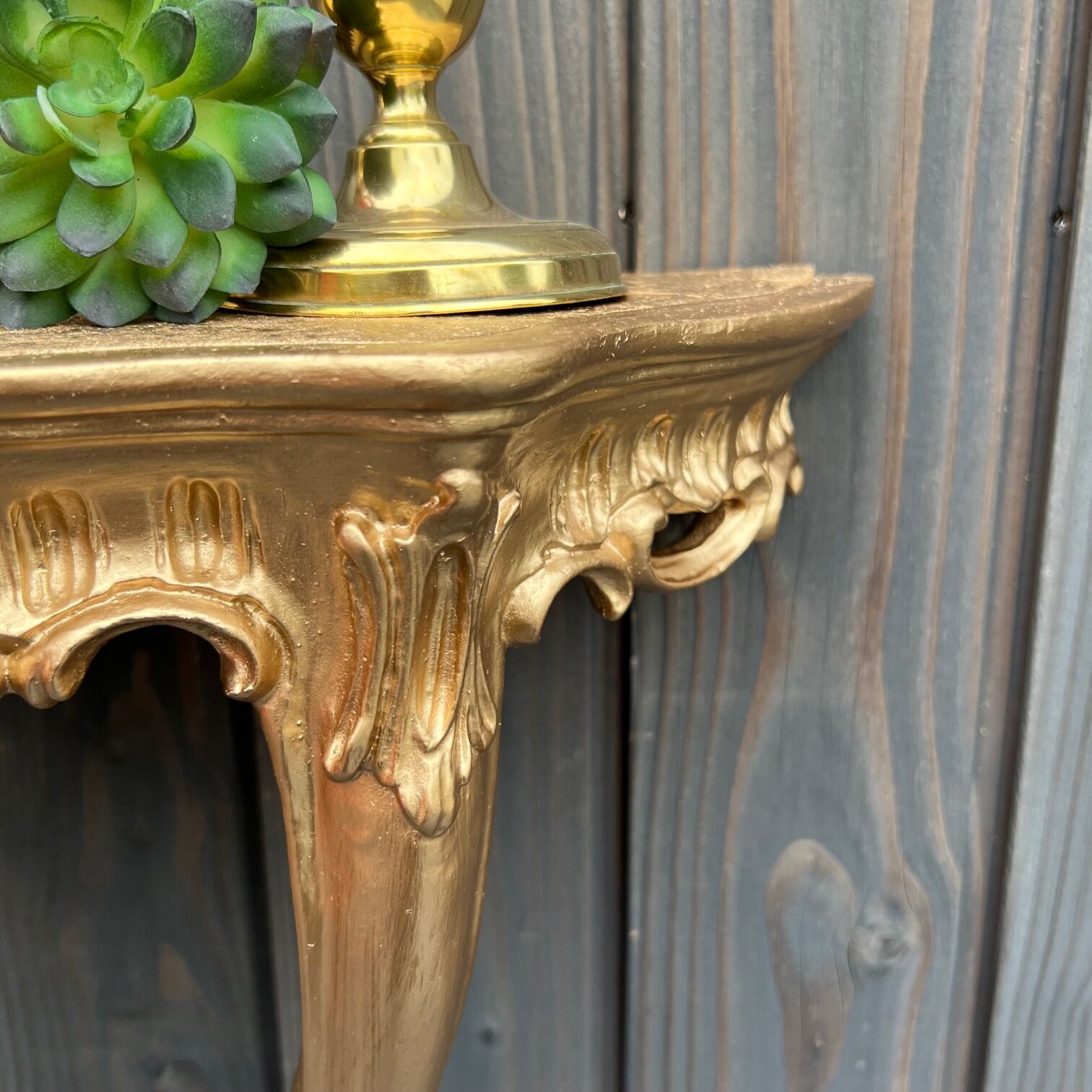 Golden wall console, baroque style