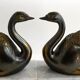 Swan bookends on marble