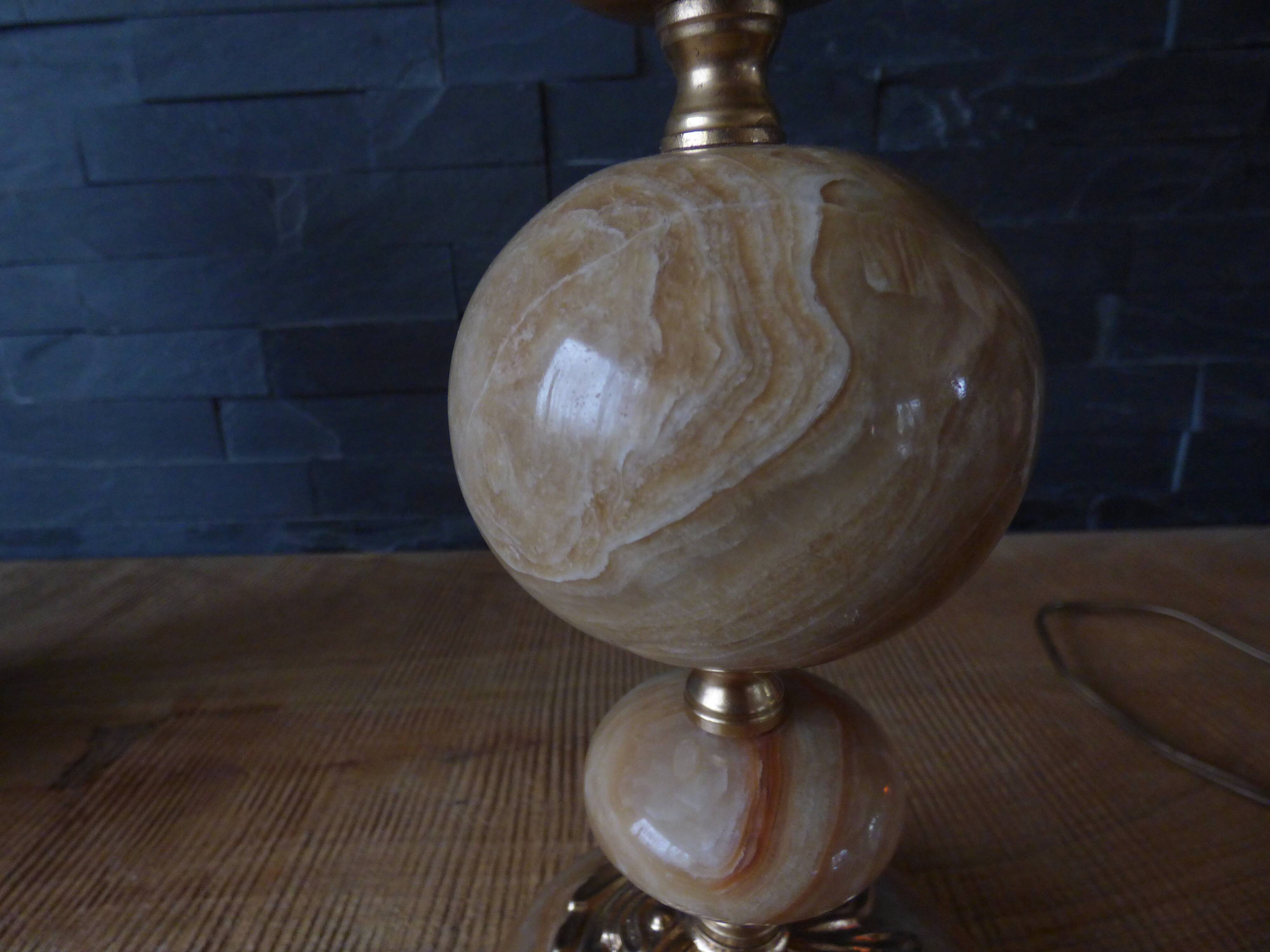 Lamp with base in polished beige-brown stones and its leather lampshade