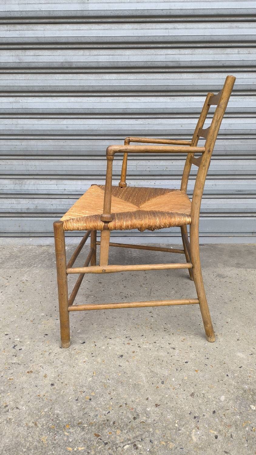 Early 19th century stepped back armchair