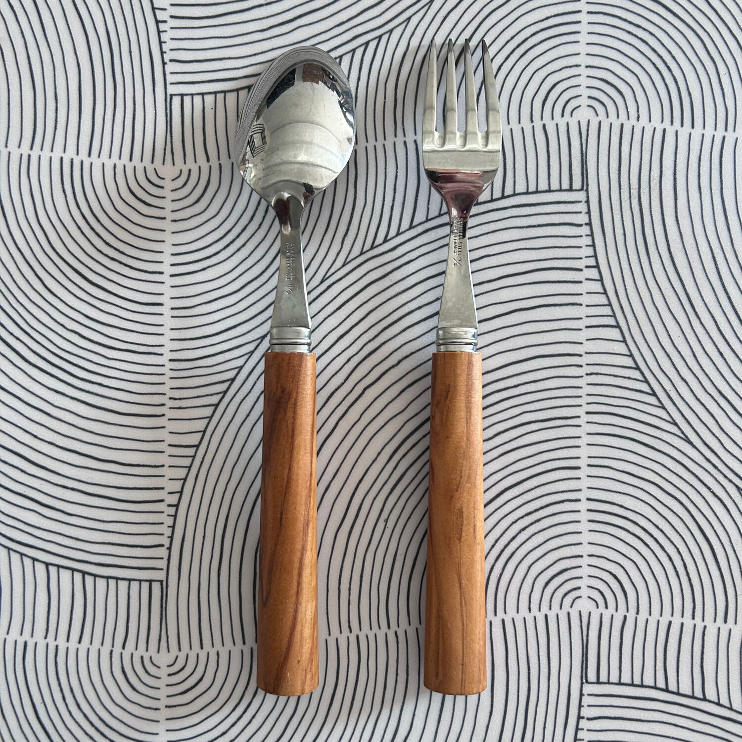 Pair of stainless steel and olive wood cutlery