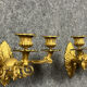 Pair of sconces period Consulate (18th) in gilded bronze with two patinas