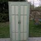 Armoire parisienne verte à panneaux vintage 1940/1950