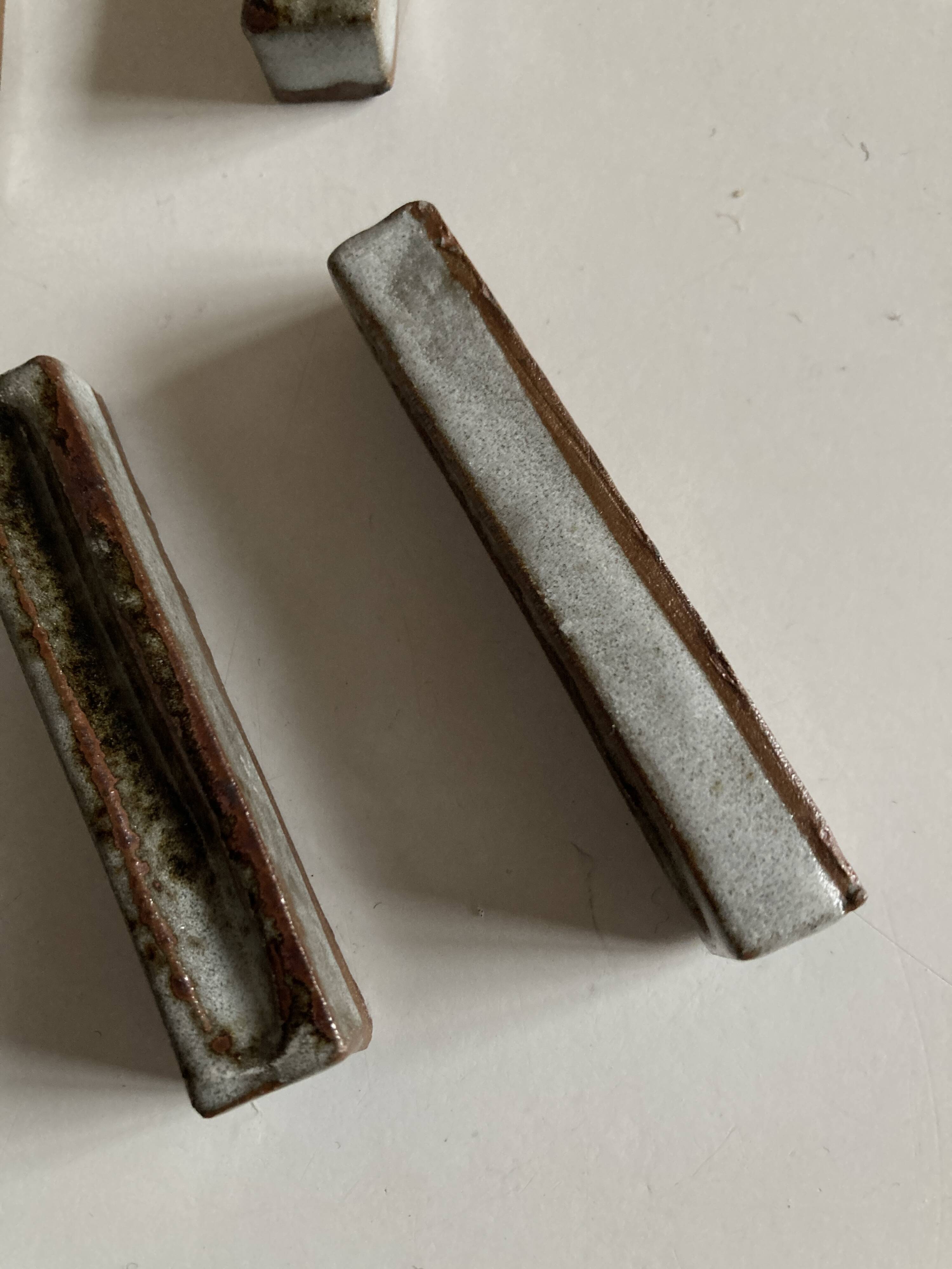 Set of 7 modernist pyrite stoneware potter's knife holders 1970