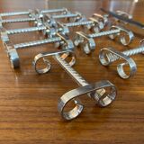 Set of 11 silver-plated metal knife holders, 1960