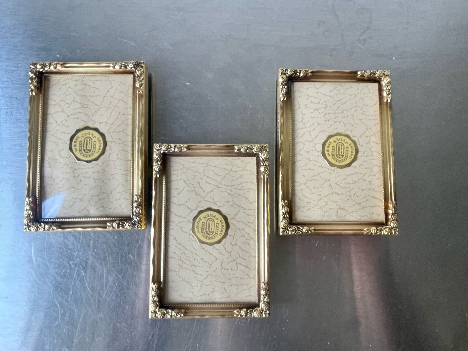Set of 3 vintage identical gold colored metal picture frames convex glass