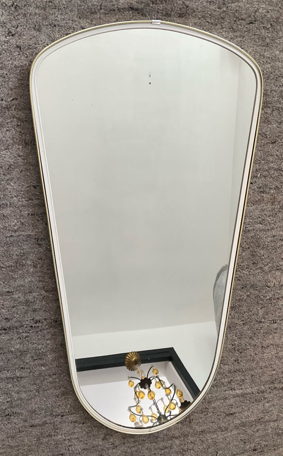 Asymmetrical free-form mirror from the 60s-70s.