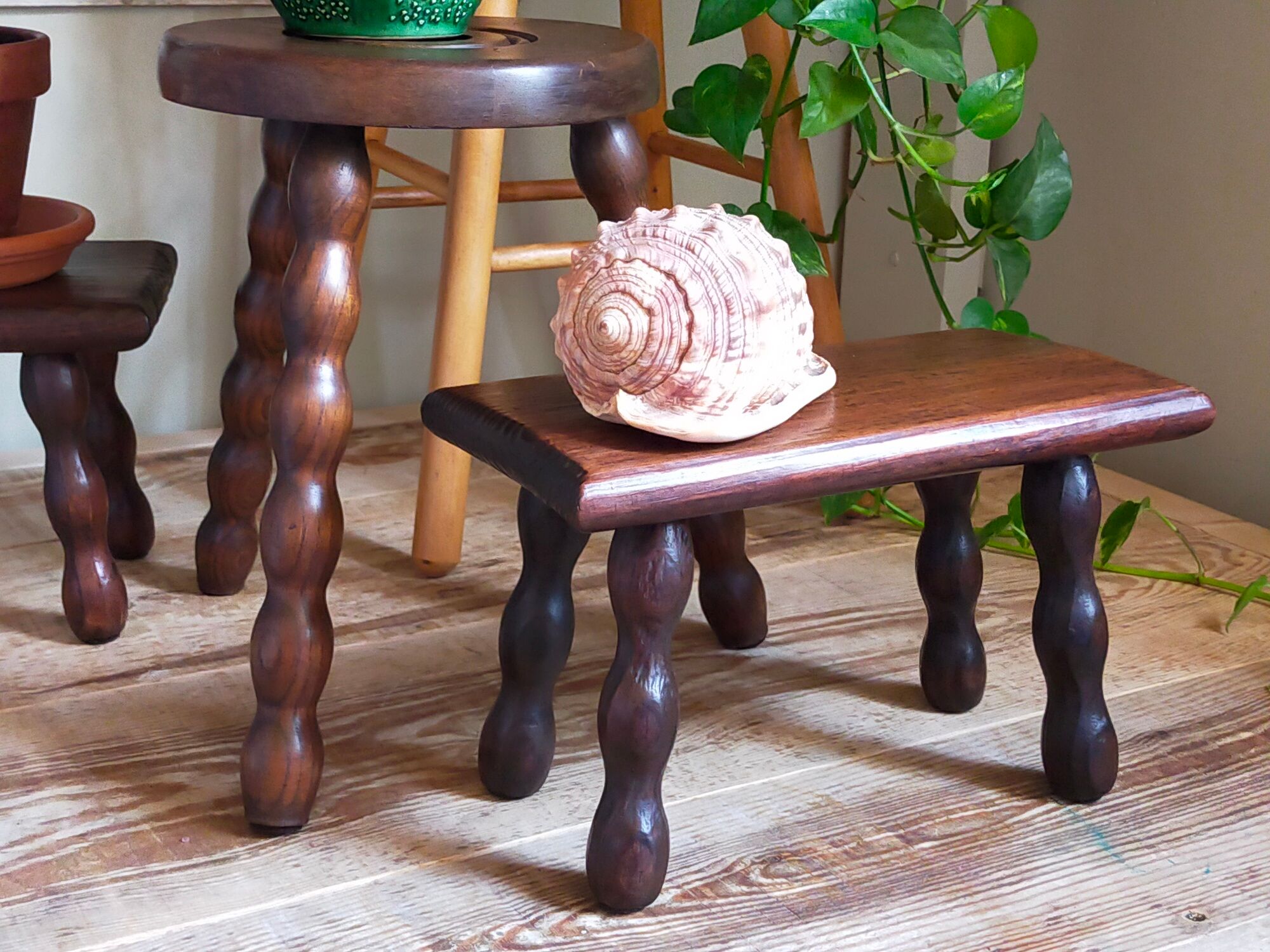 Pair of vintage solid turned wood footstools