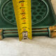 Art Deco bottle coaster in speckled green glazed ceramic and