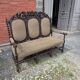Three-seater armchair in Louis XIII style made of oak from the 19th century.