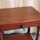 Curved solid wood side table - early 20th century