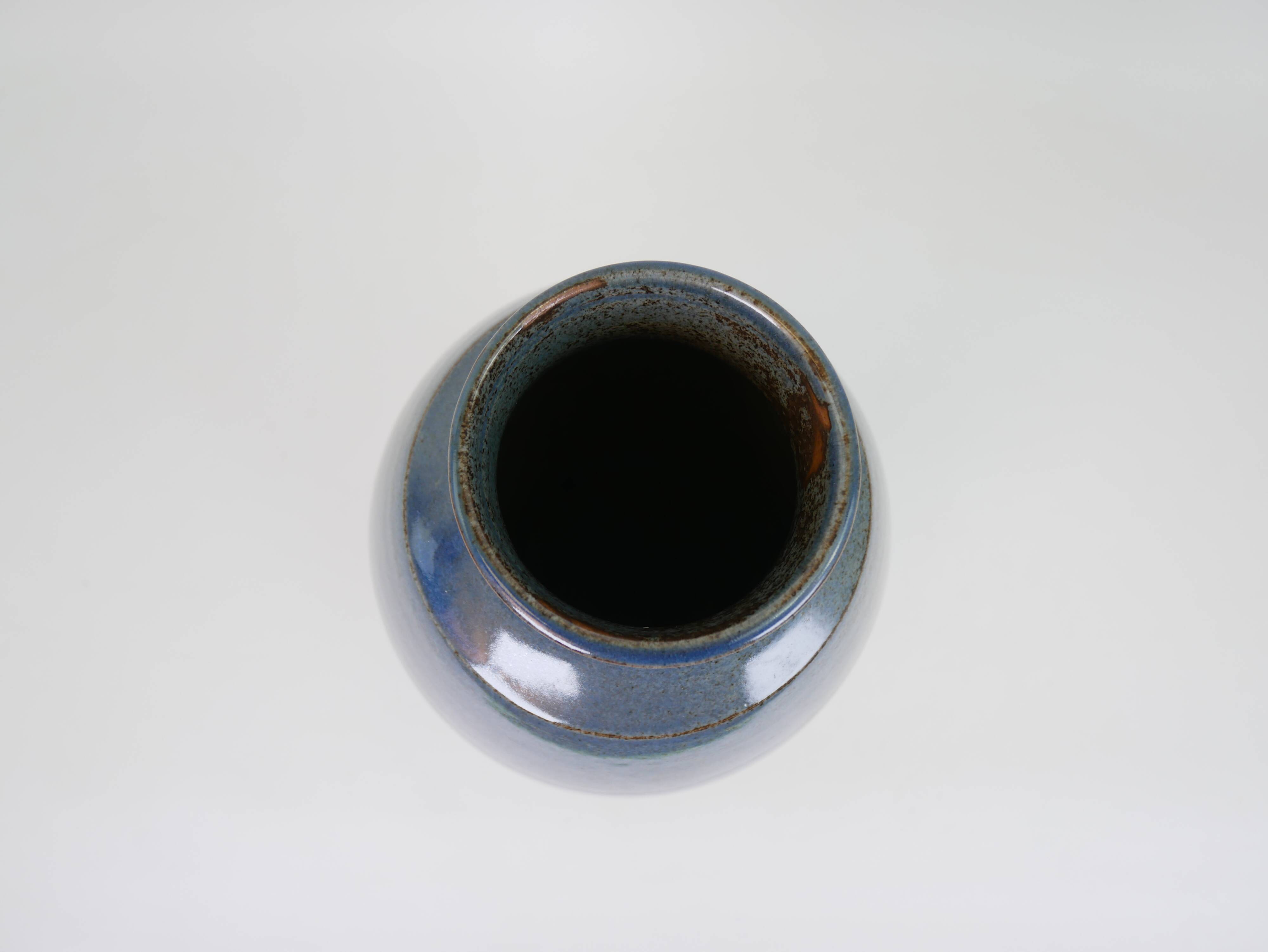 Large blue glazed ceramic vase signed under the base